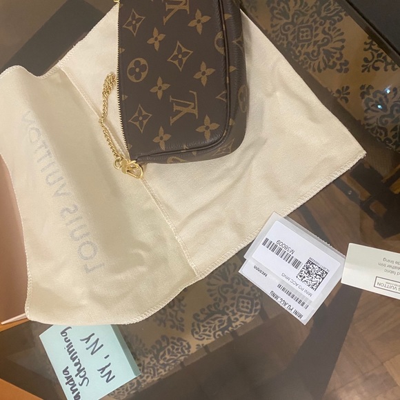 Mini pochette in monogram - Picture 14 of 16